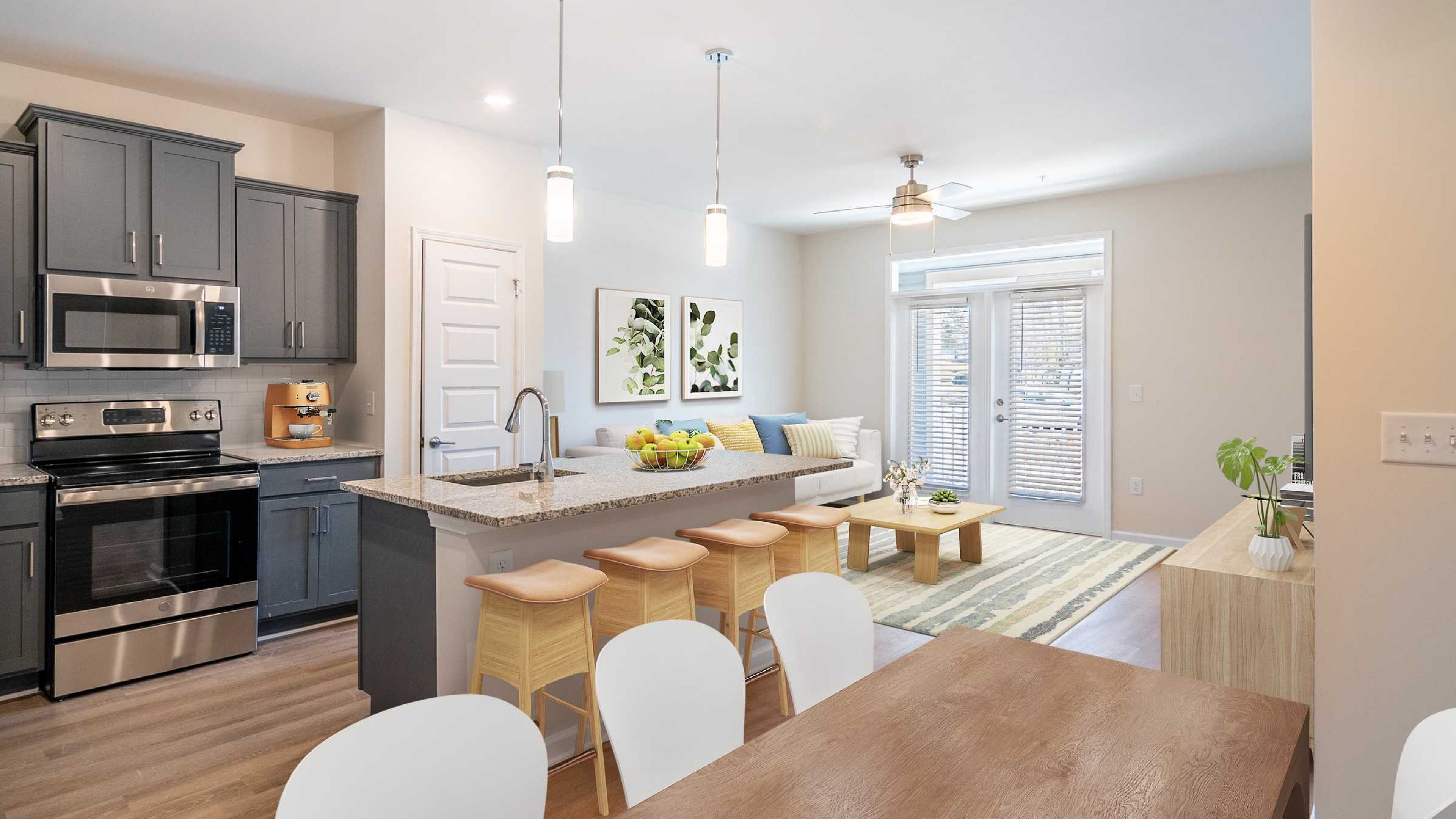 Hawthorne Palmetto apartment kitchen and living space with kitchen island and large patio doors